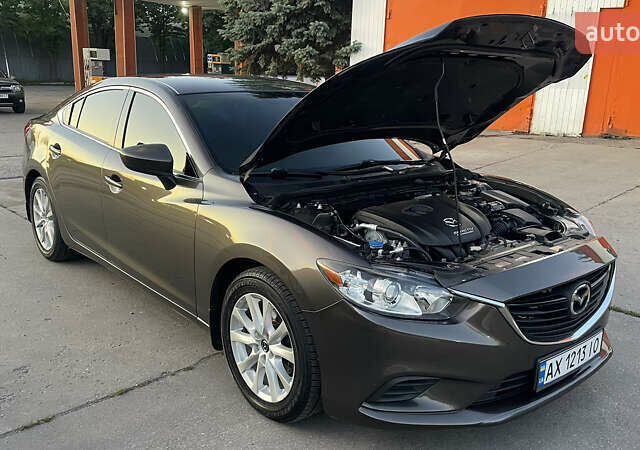 Серый Мазда 6, объемом двигателя 2.49 л и пробегом 170 тыс. км за 12500 $, фото 1 на Automoto.ua
