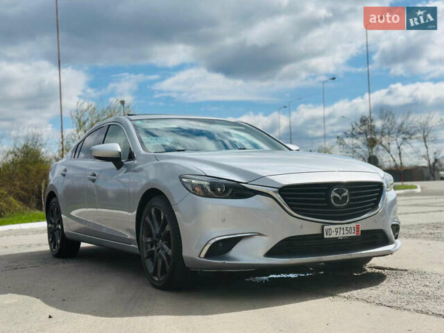 Серый Мазда 6, объемом двигателя 2.2 л и пробегом 140 тыс. км за 15750 $, фото 1 на Automoto.ua