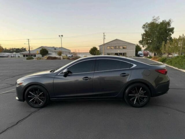 Серый Мазда 6, объемом двигателя 2.5 л и пробегом 80 тыс. км за 10000 $, фото 4 на Automoto.ua