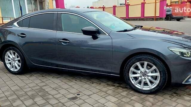 Серый Мазда 6, объемом двигателя 2.19 л и пробегом 184 тыс. км за 14500 $, фото 7 на Automoto.ua