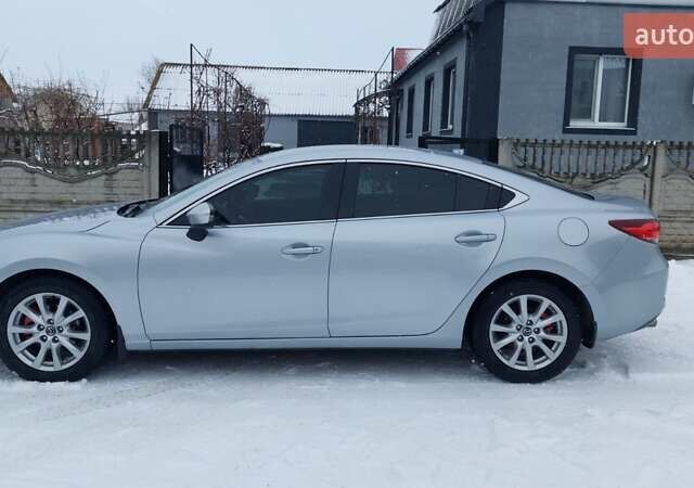 Серый Мазда 6, объемом двигателя 2.49 л и пробегом 185 тыс. км за 12000 $, фото 1 на Automoto.ua