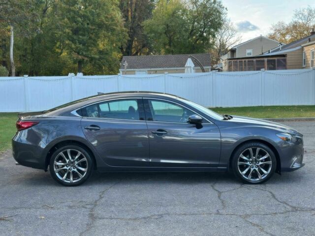 Сірий Мазда 6, об'ємом двигуна 2 л та пробігом 75 тис. км за 7500 $, фото 6 на Automoto.ua