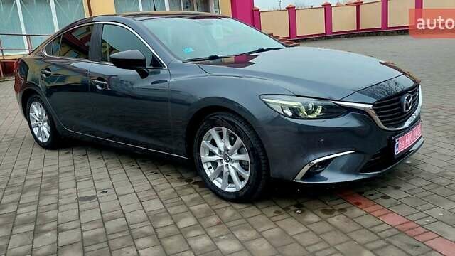 Серый Мазда 6, объемом двигателя 2.19 л и пробегом 184 тыс. км за 14500 $, фото 8 на Automoto.ua