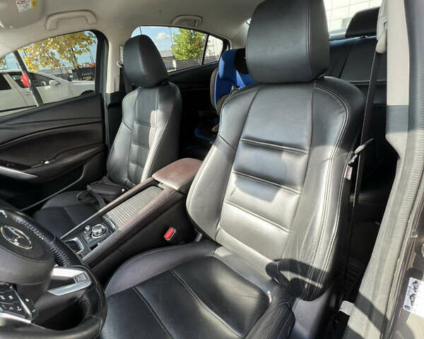 Сірий Мазда 6, об'ємом двигуна 2.19 л та пробігом 212 тис. км за 15000 $, фото 32 на Automoto.ua