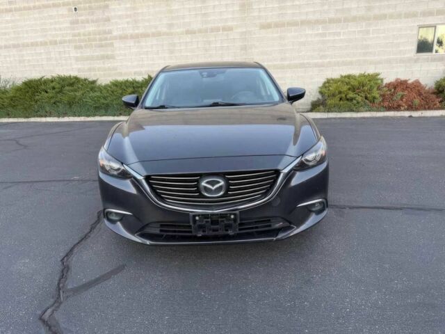 Серый Мазда 6, объемом двигателя 2.5 л и пробегом 80 тыс. км за 10000 $, фото 1 на Automoto.ua