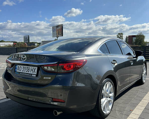 Сірий Мазда 6, об'ємом двигуна 2.19 л та пробігом 212 тис. км за 15000 $, фото 4 на Automoto.ua