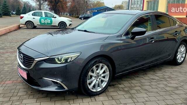 Серый Мазда 6, объемом двигателя 2.19 л и пробегом 184 тыс. км за 14500 $, фото 1 на Automoto.ua
