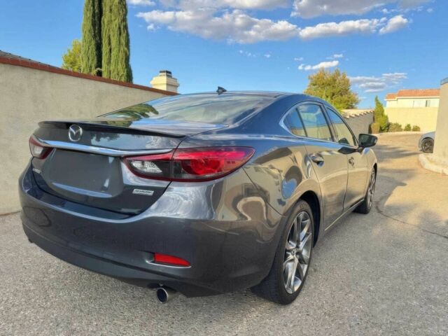 Серый Мазда 6, объемом двигателя 2.5 л и пробегом 76 тыс. км за 6300 $, фото 3 на Automoto.ua