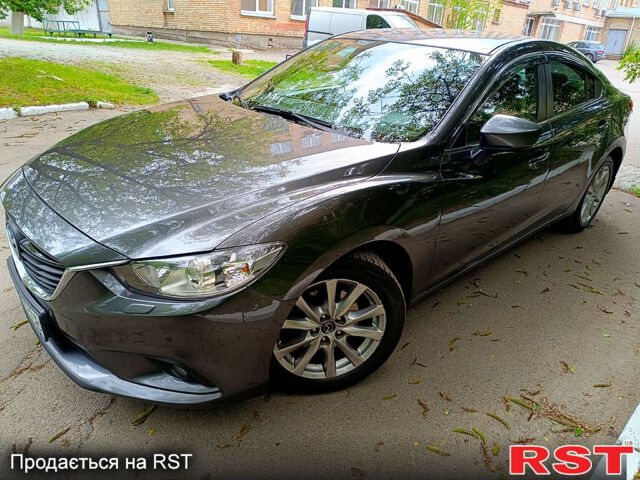 Серый Мазда 6, объемом двигателя 2 л и пробегом 186 тыс. км за 14900 $, фото 1 на Automoto.ua