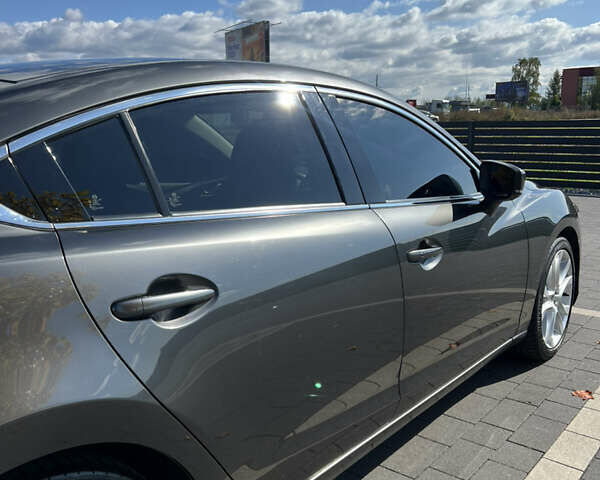 Сірий Мазда 6, об'ємом двигуна 2.19 л та пробігом 212 тис. км за 15000 $, фото 2 на Automoto.ua