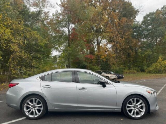 Серый Мазда 6, объемом двигателя 2.5 л и пробегом 77 тыс. км за 7000 $, фото 5 на Automoto.ua