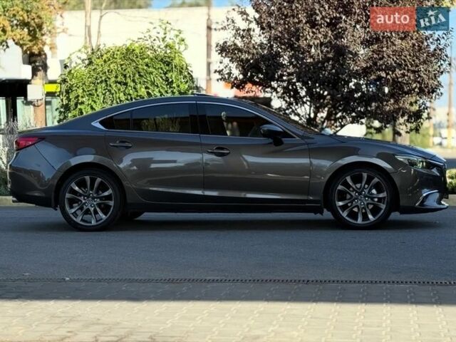 Серый Мазда 6, объемом двигателя 2.49 л и пробегом 201 тыс. км за 14800 $, фото 5 на Automoto.ua