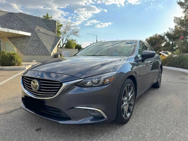 Сірий Мазда 6, об'ємом двигуна 2.5 л та пробігом 76 тис. км за 9900 $, фото 1 на Automoto.ua