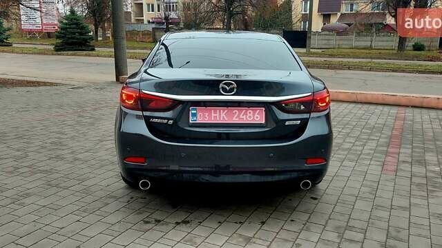 Серый Мазда 6, объемом двигателя 2.19 л и пробегом 184 тыс. км за 14500 $, фото 4 на Automoto.ua
