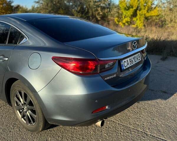 Серый Мазда 6, объемом двигателя 2.49 л и пробегом 138 тыс. км за 12500 $, фото 6 на Automoto.ua