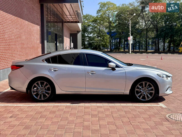 Серый Мазда 6, объемом двигателя 2 л и пробегом 147 тыс. км за 13700 $, фото 2 на Automoto.ua