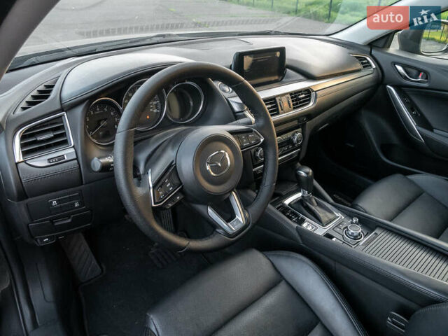 Серый Мазда 6, объемом двигателя 2.49 л и пробегом 141 тыс. км за 16300 $, фото 9 на Automoto.ua