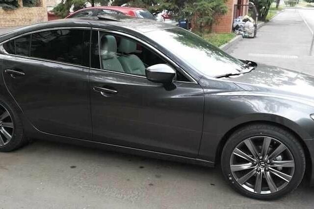 Серый Мазда 6, объемом двигателя 2 л и пробегом 62 тыс. км за 6000 $, фото 2 на Automoto.ua
