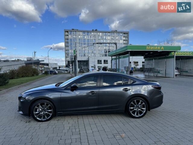 Сірий Мазда 6, об'ємом двигуна 2.19 л та пробігом 225 тис. км за 16000 $, фото 3 на Automoto.ua