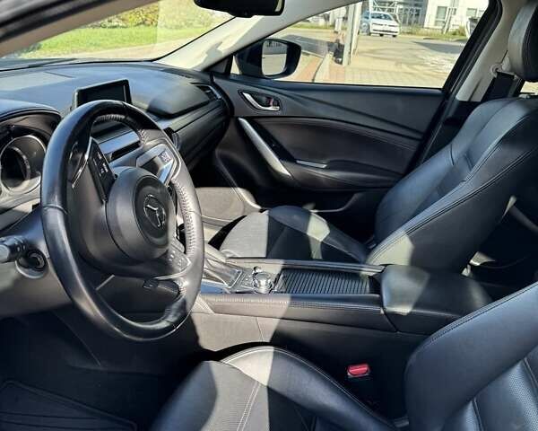 Серый Мазда 6, объемом двигателя 2.19 л и пробегом 215 тыс. км за 16800 $, фото 10 на Automoto.ua