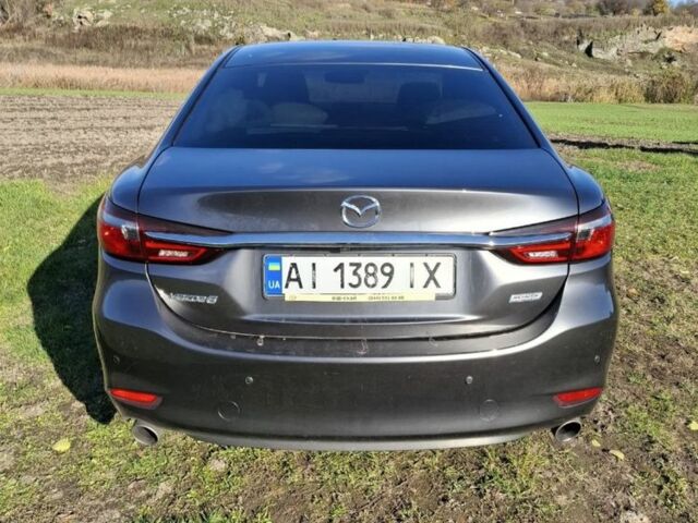 Серый Мазда 6, объемом двигателя 2.5 л и пробегом 142 тыс. км за 16500 $, фото 5 на Automoto.ua