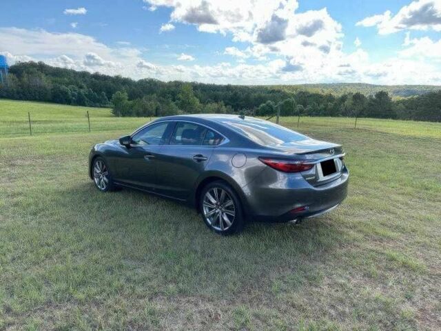 Серый Мазда 6, объемом двигателя 2.5 л и пробегом 99 тыс. км за 7000 $, фото 3 на Automoto.ua