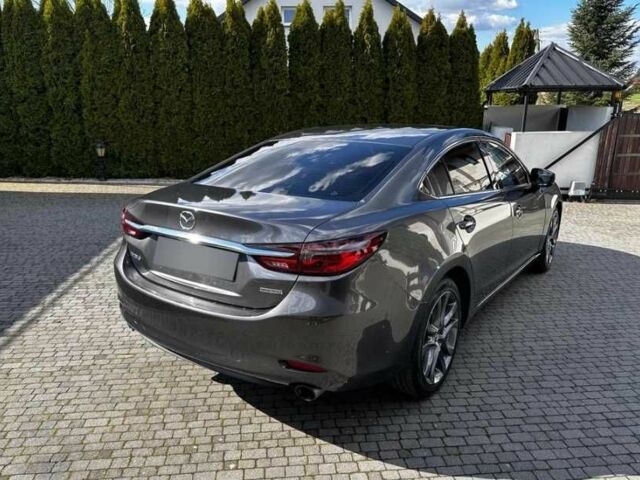Серый Мазда 6, объемом двигателя 2.5 л и пробегом 75 тыс. км за 12800 $, фото 3 на Automoto.ua