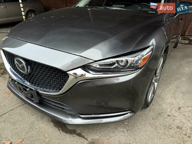 Серый Мазда 6, объемом двигателя 2.49 л и пробегом 129 тыс. км за 15500 $, фото 2 на Automoto.ua