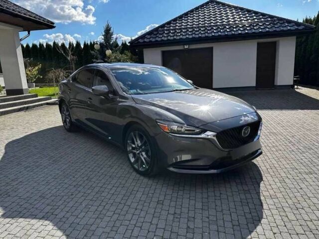 Серый Мазда 6, объемом двигателя 2.5 л и пробегом 75 тыс. км за 12800 $, фото 5 на Automoto.ua