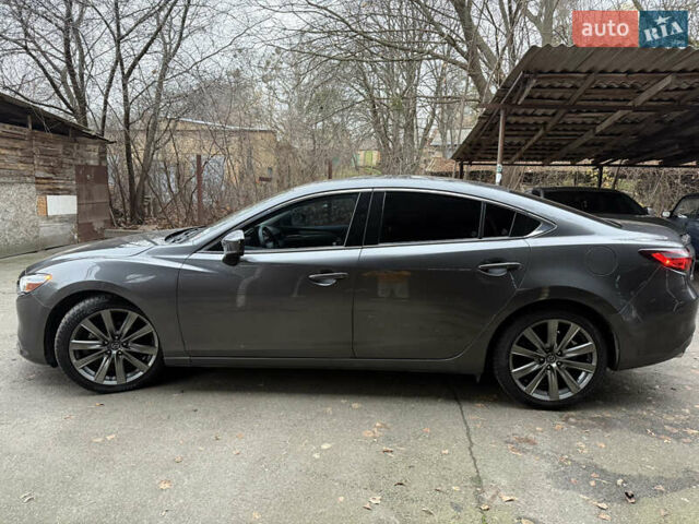 Серый Мазда 6, объемом двигателя 2.49 л и пробегом 129 тыс. км за 15500 $, фото 4 на Automoto.ua