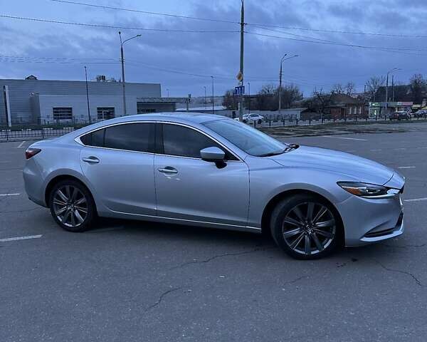 Серый Мазда 6, объемом двигателя 2.49 л и пробегом 123 тыс. км за 18000 $, фото 1 на Automoto.ua