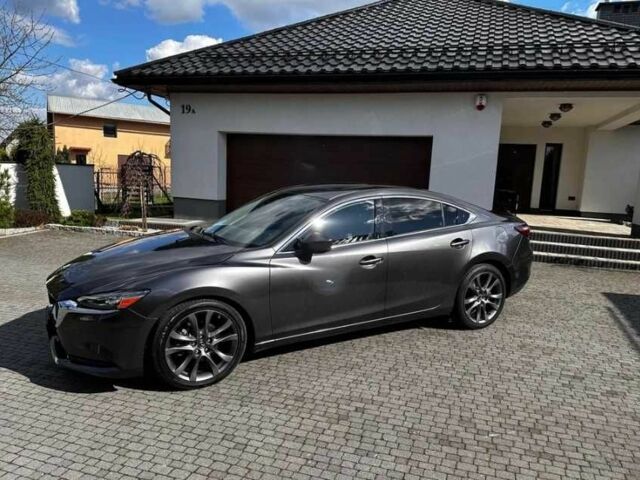 Серый Мазда 6, объемом двигателя 2.5 л и пробегом 75 тыс. км за 12800 $, фото 1 на Automoto.ua