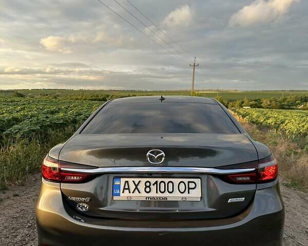 Серый Мазда 6, объемом двигателя 2.49 л и пробегом 179 тыс. км за 15900 $, фото 7 на Automoto.ua