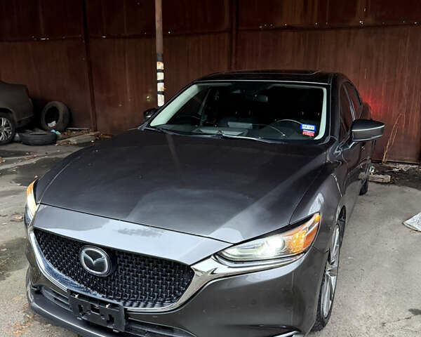 Серый Мазда 6, объемом двигателя 2.49 л и пробегом 129 тыс. км за 15500 $, фото 1 на Automoto.ua