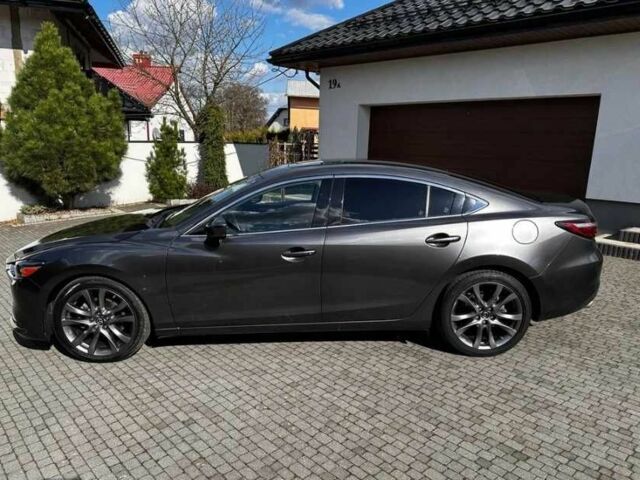 Серый Мазда 6, объемом двигателя 2.5 л и пробегом 75 тыс. км за 12800 $, фото 2 на Automoto.ua