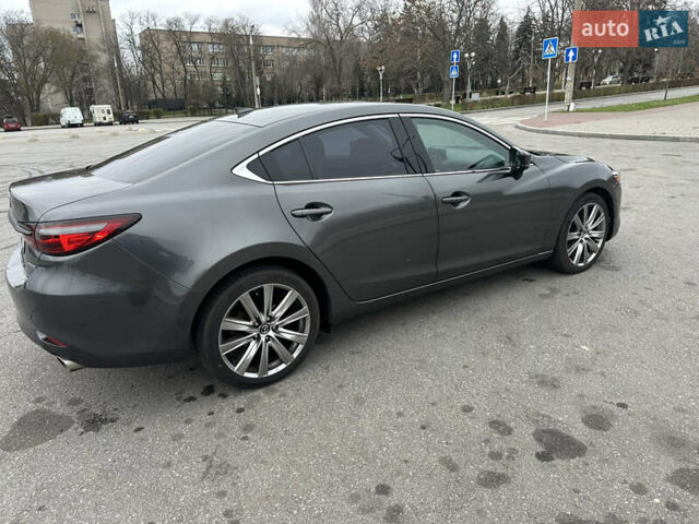 Серый Мазда 6, объемом двигателя 2.49 л и пробегом 113 тыс. км за 17700 $, фото 5 на Automoto.ua