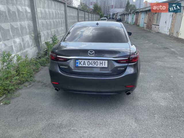 Серый Мазда 6, объемом двигателя 2.49 л и пробегом 56 тыс. км за 17500 $, фото 1 на Automoto.ua