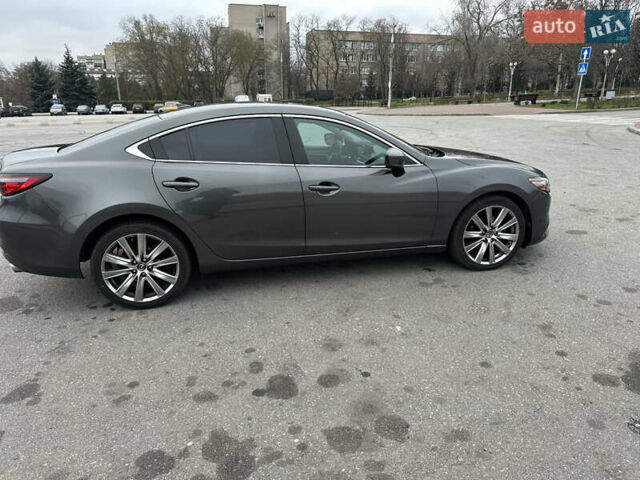 Серый Мазда 6, объемом двигателя 2.49 л и пробегом 113 тыс. км за 17700 $, фото 7 на Automoto.ua