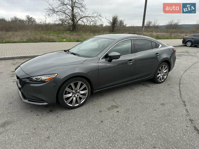 Серый Мазда 6, объемом двигателя 2.49 л и пробегом 113 тыс. км за 17700 $, фото 2 на Automoto.ua