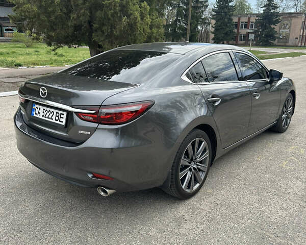 Серый Мазда 6, объемом двигателя 2.49 л и пробегом 75 тыс. км за 20000 $, фото 5 на Automoto.ua
