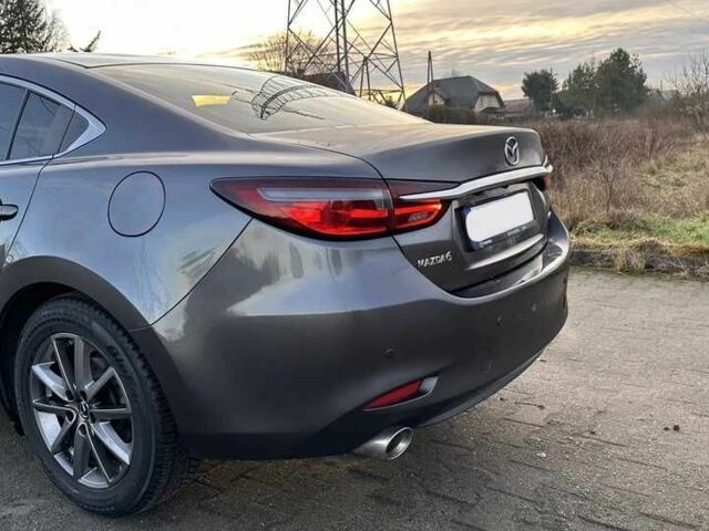 Серый Мазда 6, объемом двигателя 2 л и пробегом 68 тыс. км за 10100 $, фото 1 на Automoto.ua