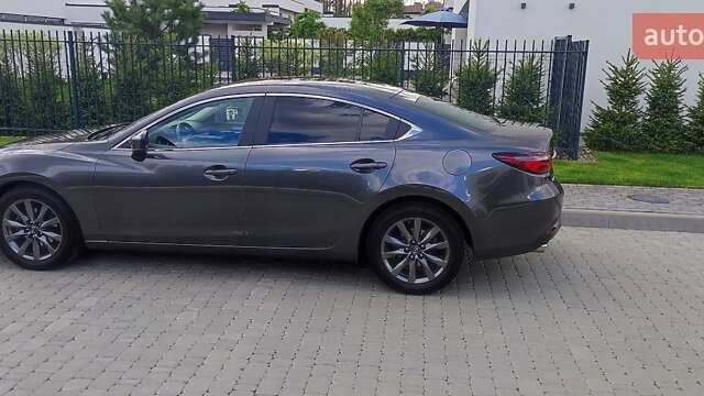 Сірий Мазда 6, об'ємом двигуна 2 л та пробігом 60 тис. км за 21800 $, фото 4 на Automoto.ua