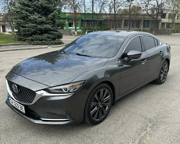 Серый Мазда 6, объемом двигателя 2.49 л и пробегом 75 тыс. км за 20000 $, фото 3 на Automoto.ua