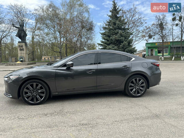 Серый Мазда 6, объемом двигателя 2.49 л и пробегом 75 тыс. км за 20000 $, фото 7 на Automoto.ua