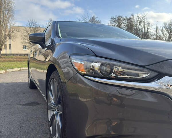 Серый Мазда 6, объемом двигателя 2.5 л и пробегом 63 тыс. км за 18500 $, фото 18 на Automoto.ua