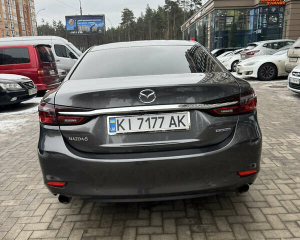Серый Мазда 6, объемом двигателя 2.49 л и пробегом 99 тыс. км за 14500 $, фото 2 на Automoto.ua