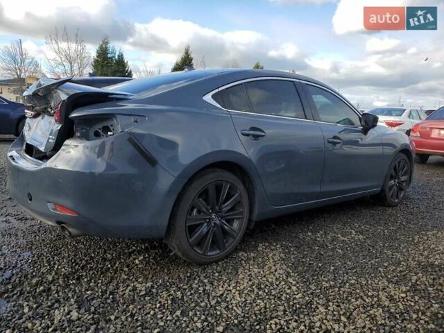 Серый Мазда 6, объемом двигателя 2.49 л и пробегом 56 тыс. км за 4299 $, фото 2 на Automoto.ua