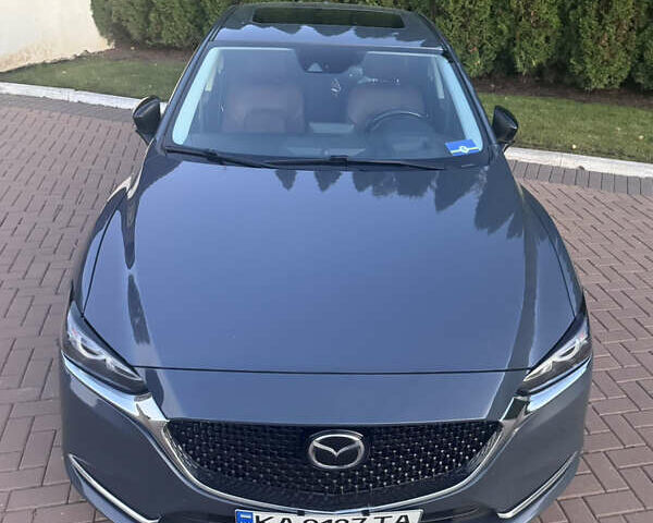 Серый Мазда 6, объемом двигателя 2.49 л и пробегом 100 тыс. км за 24500 $, фото 1 на Automoto.ua