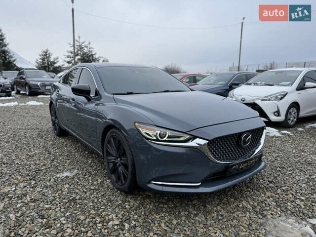 Серый Мазда 6, объемом двигателя 2.49 л и пробегом 99 тыс. км за 19999 $, фото 1 на Automoto.ua