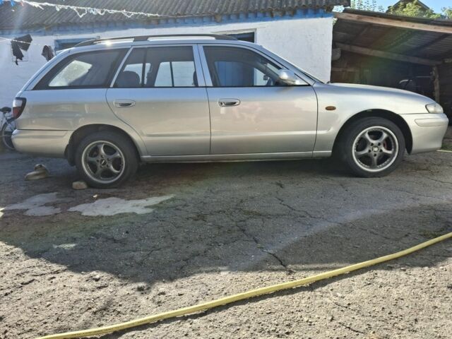 Серый Мазда 6, объемом двигателя 2 л и пробегом 260 тыс. км за 3000 $, фото 1 на Automoto.ua